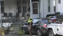Car hits house in Dorchester, sparking small fire